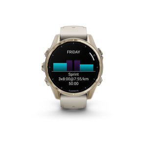 fēnix® 8 – 43 mm, AMOLED, Sapphire, Soft Gold mit Fog Grey/Dark Sandstone Silikonarmband – Garmin