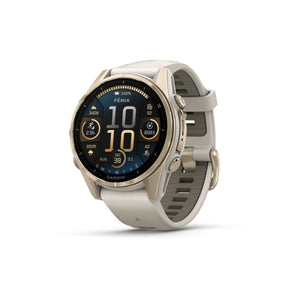 fēnix® 8 – 43 mm, AMOLED, Sapphire, Soft Gold mit Fog Grey/Dark Sandstone Silikonarmband – Garmin